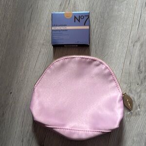 No 7 lift & luminate triple action finishing powder new sealed with clar…